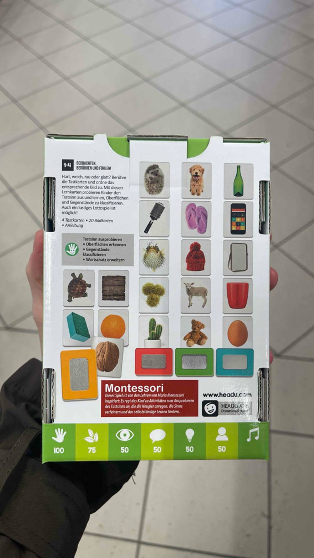 Montessori-Spielzeug-Test: Verschiedene Abbildungen auf der Verpackung.