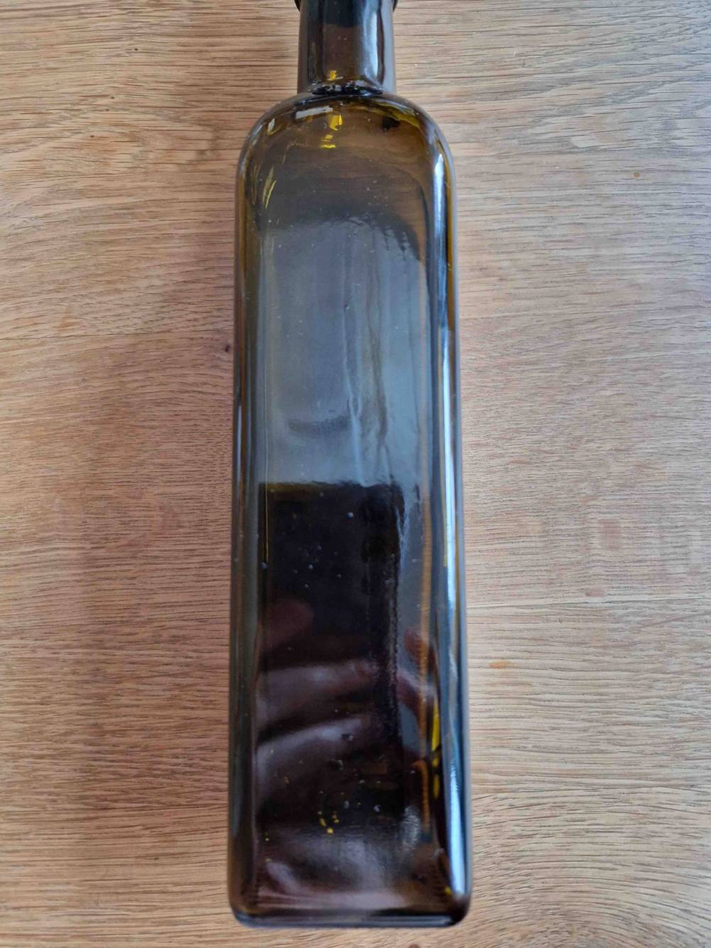 Schwarzkümmelöl getestet: Rückseite der Flasche ohne Etikett.
