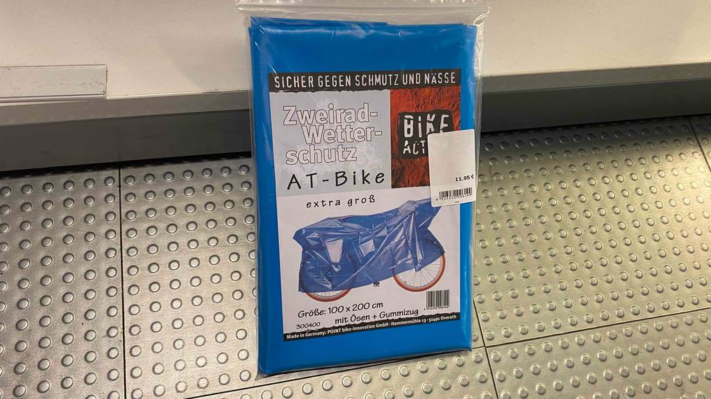 Fahrradschutzhülle im Test: blaue Fahrradschutzhülle extra groß mit 100 x 200 cm in Verpackung.