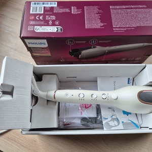 Auto Curler 8000 von Philips im Karton, inklusive Bedienungsanleitung und Erste-Schritte-Leitfaden