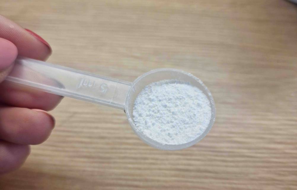 Magensium in Messlöffel.