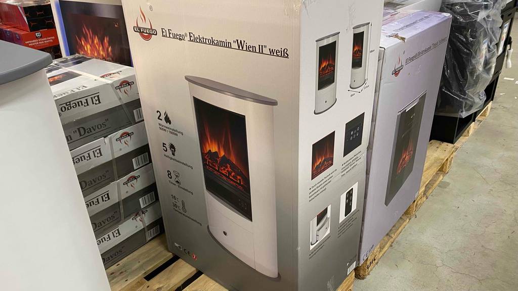 Elektrokamin im Test: Die Verpackung von einem weißen Elektrokamin mit Temperatureinstellungen.
