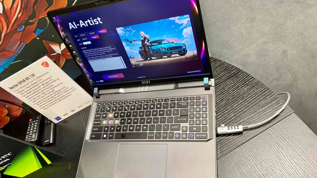 Ein Laptop der Marke MSI steht auf einem schwarzen Tisch.