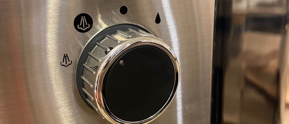 Im Test: Detailaufnahme Bedienelement einer Espressomaschine.