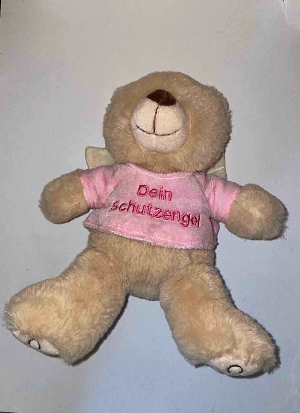 Kuscheltier - Teddy liegend.