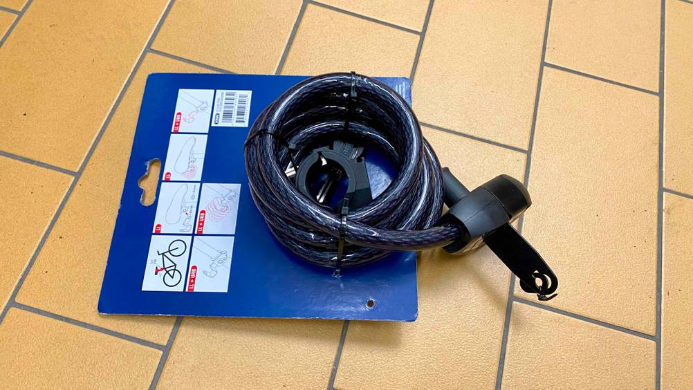 Abus-Fahrradschloss getestet: Rückseite der Verpackung mit Inforgrafiken.