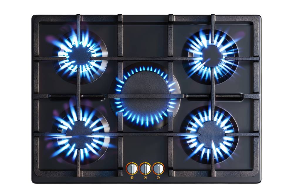 Gaskochfeld-75-cm im Test: Ein 5-flammiges Gaskochfeld, bei dem alle Brenner angezündet sind.