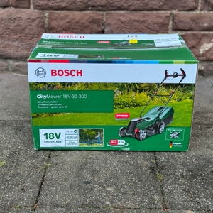 Karton des getesteten Akku-Rasenmähers von Bosch.