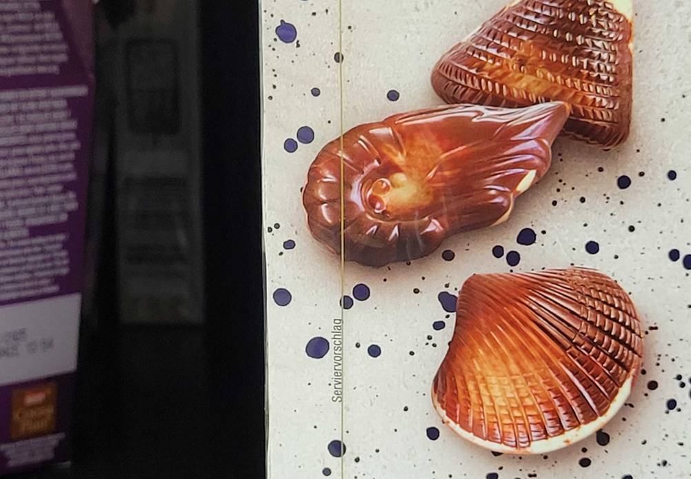 Belgische Pralinen getestet: Nahaufnahme der Grafiken auf der Vorderseite.