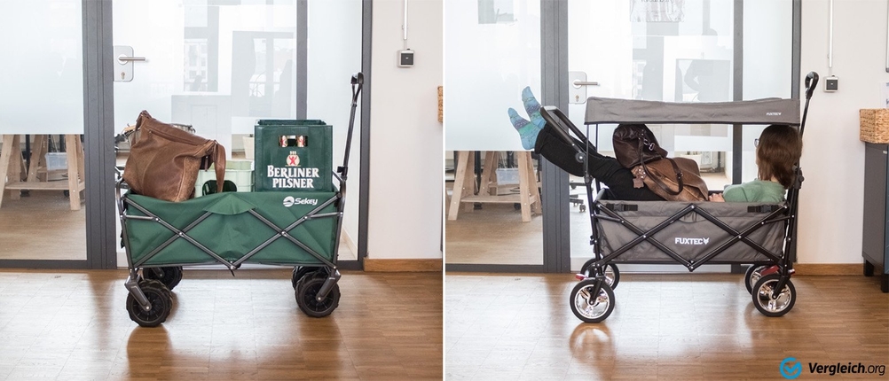 2 Bollerwagen in einem Raum - einer mit Tasche und Bierkästen und einer mit einer Person beladen