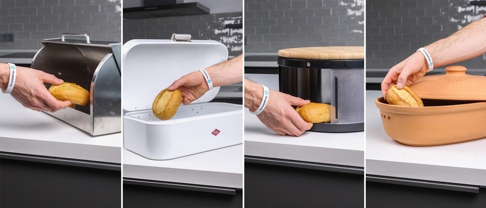 4 Brotkästen, in die jeweils 1 Brötchen gelegt wird