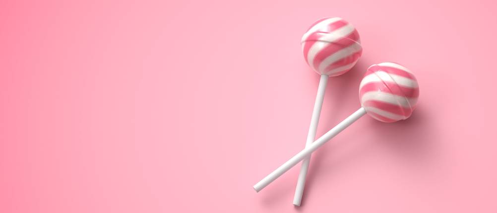 candy-grabber-test-zwei-lollies-auf-rosa-hintergrund