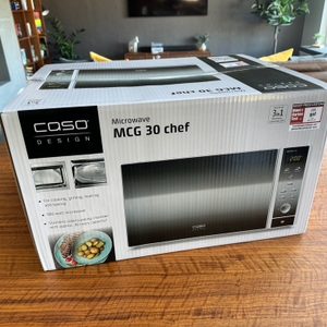 Der Karton der Caso MCG30 Chef steht auf einem Tisch