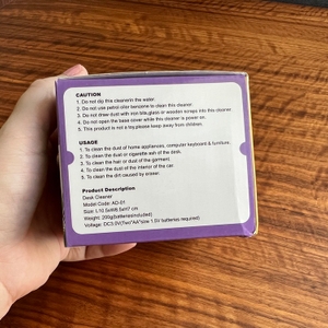 Cisixin-Mini-Staub-Reiniger Rückseite Karton mit Hinweisen des Herstellers.