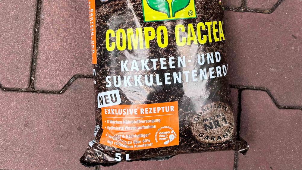 Compo-Erde getestet: Nahaufnahme der Verpackung mit Informationen und Artikelbezeichnung.