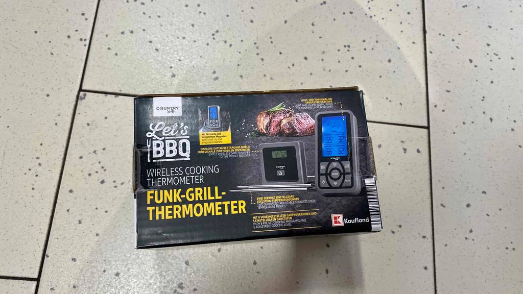 Countryside-Funk-Grillthermometer im Test: Eine Verpackung liegt auf dem Boden.