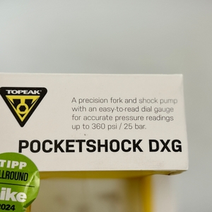 Detailaufnahme der Verpackung der Pocketshock DXG. Die technischen Angaben und der Produktname sind gut lesbar.