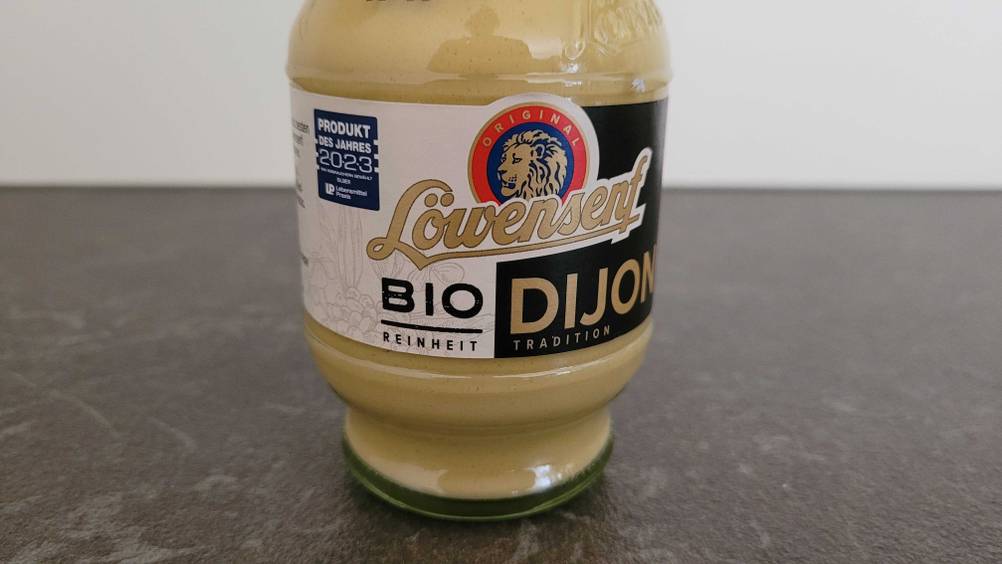 Dijon-Senf getestet: Nahaufnahme des Labels mit Informationen wie Bio-Reinheit.