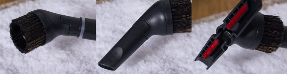 Verschiedene Düsen eines Staubsaugers im Test.