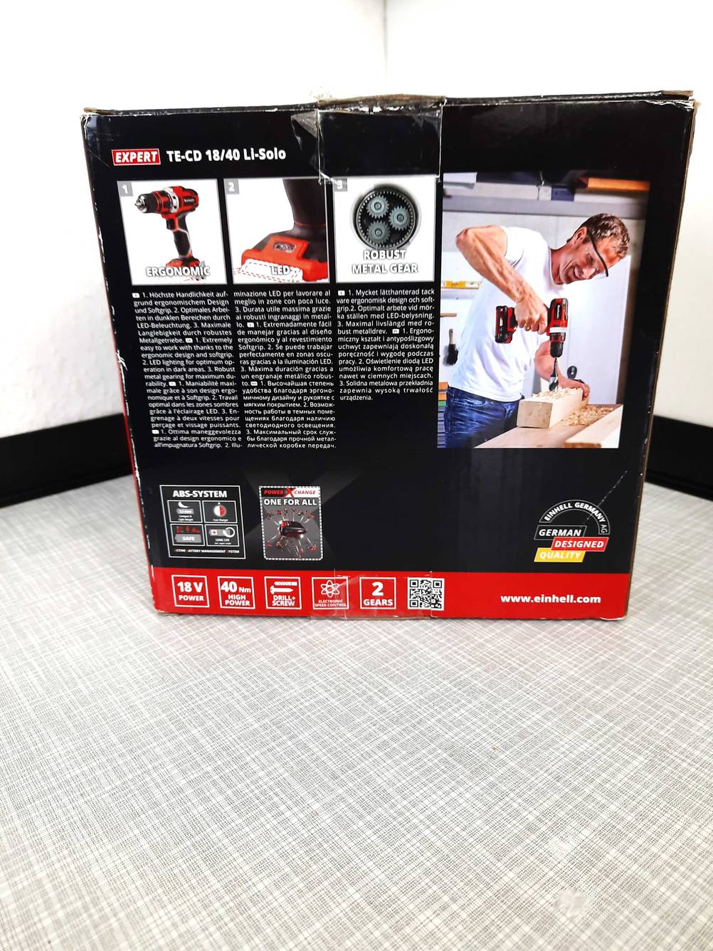 Rückseite einer Originalverpackung des Einhell-Akkuschrauber 18V im Test mit Bildern und Informationen.