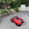 Die Einhell E-SW 18/610 steht auf Pflaster.