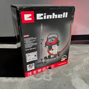 Der Karton des Einhell TE-VC 2025 SACL steht auf einem grauen Boden