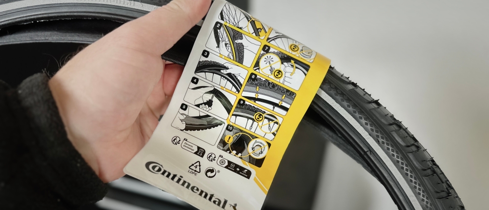 Das Hinweisschild am Continental-Fahrradreifen im Detail.