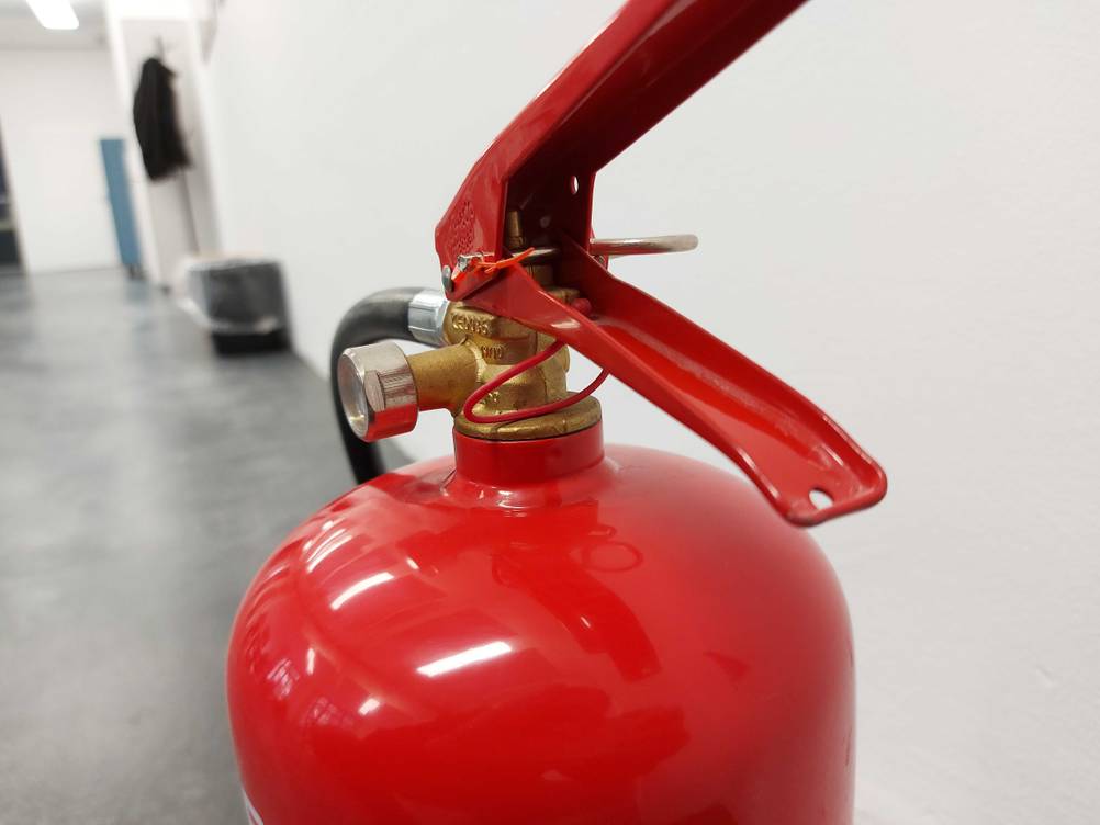 Feuerlöscher-Griff