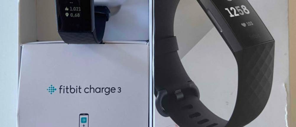 Fitness-Armband im Test: Fitness-Armband in und auf Verpackung
