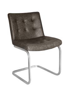 Schwingstuhl-Test: Ein Freischwinger mit einer Sitzfläche aus Kunstleder und einem Metallgestell.
