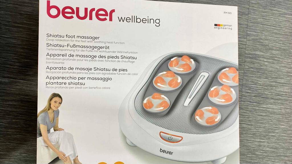 Verpackung von einem getesteten Fußmassagegerät.