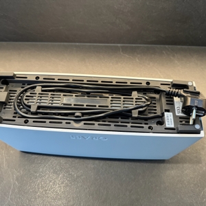 Die Unterseite des Graef TO91 mit Kabelaufwicklung.