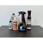 Die getesteten Grillreiniger von Enders, Weber und Bio-chem nebeneinander auf einem Tisch.