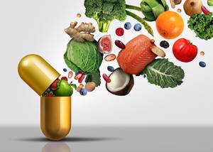 Vitamins supplements as a capsule with fruit vegetables nuts and beans inside a nutrient pill as a natural medicine health treatment with 3D illustration elements.
