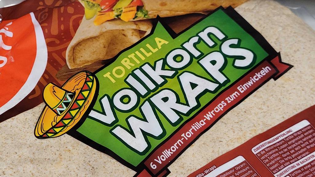 Tortilla-Wraps-Test: Detailansicht des Schriftzuges »Vollkorn Wraps« auf der Verpackung.