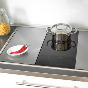 Abdeckplatten für das Ceranfeld schützen die Platte und können als Schneidbrett verwendet werden.