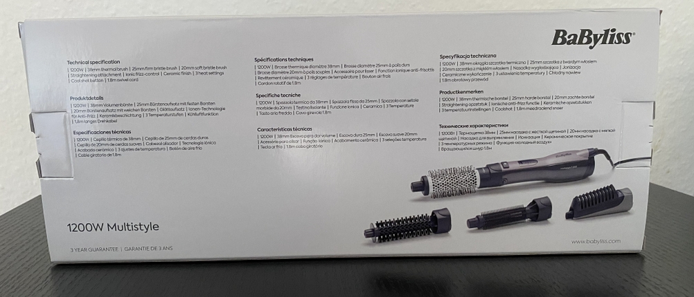 Die Rückseite der Verpackung der BaByliss AS121E Warmluftbürste.