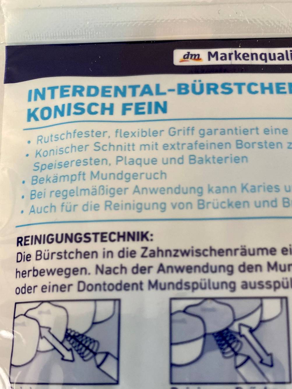 Rückseite von einer Packung mit getesteten Interdentalbürsten.
