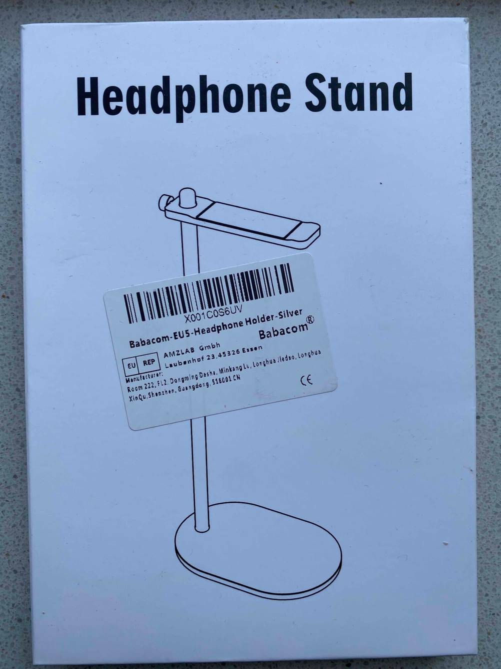 Vorderseite der Originalverpackung eines getesteten Kopfhörerständers.