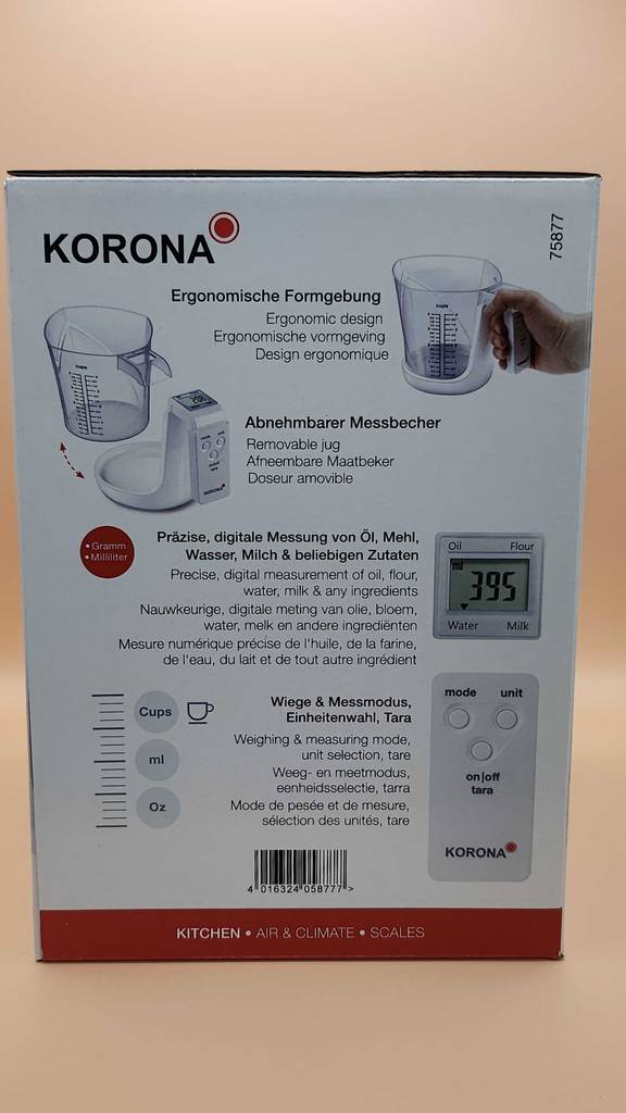 Detailansicht der Produktbeschreibung auf der Verpackung eines Messbechers mit Waage im Test.