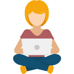 Eine Frau sitzt am Laptop.