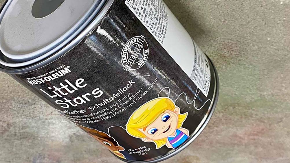 Nahaufnahme der Grafik auf einer Dose Magnetfarbe.
