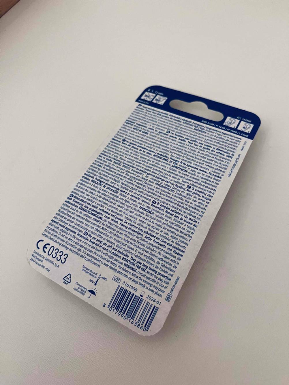 Ansicht der rückseitigen Beschreibung von einer Verpackung mit Ohrstöpseln im Test.