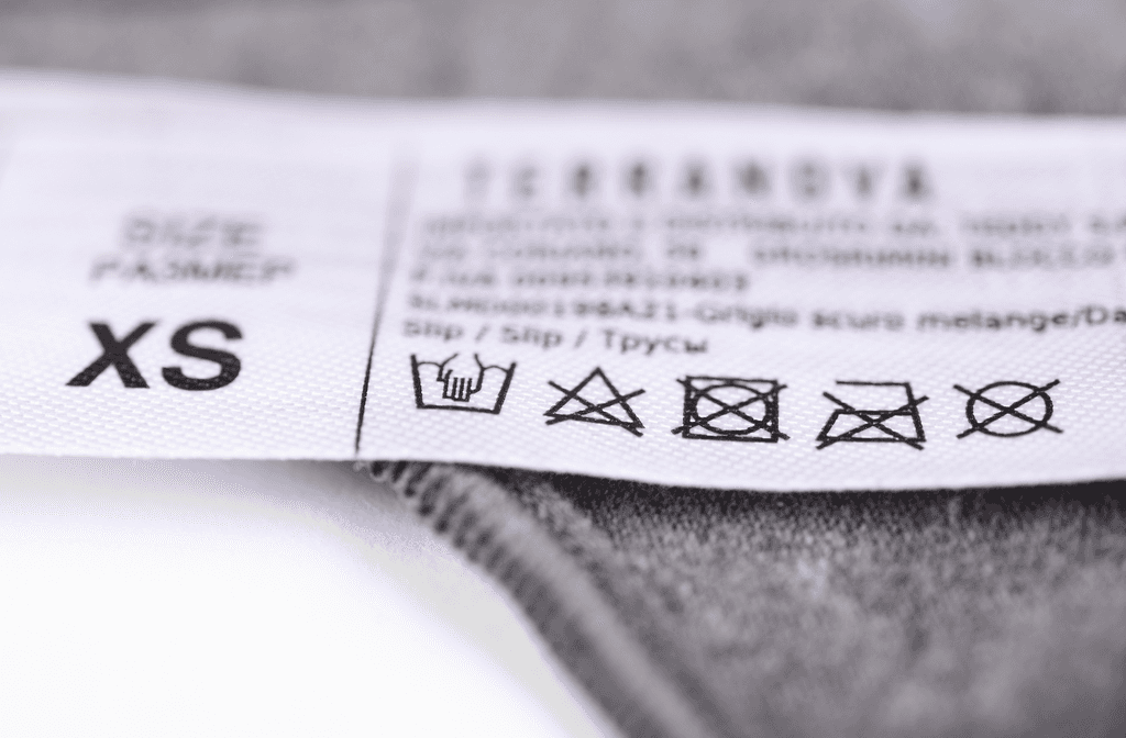 Merino-unterwäsche-damen-test: Nahaufnahme eines Pflegeetiketts. 