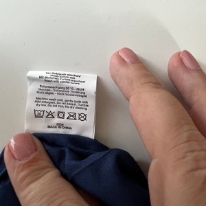 Waschzettel des Miqio-2in1-Hüttenschlafsacks