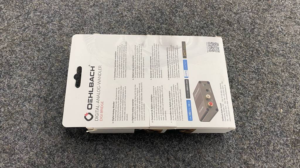 DA-Wandler im Test: Auf der Rückseite der Verpackung sind einige Informationen zu lesen.