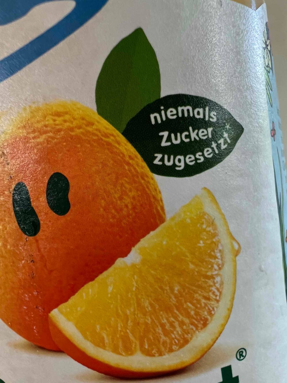 Orangensaft getestet: Nahaufnahme des Aufdrucks mit der Information, daß kein Zucker zugesetzt wird.