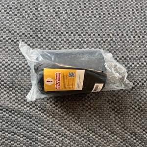 Die Outdoorer Trek Bed 2 liegt in ihrer Verpackung auf einem Teppich