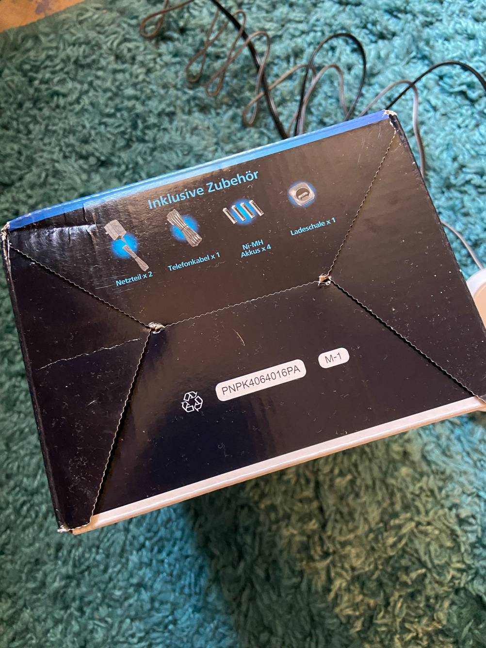 Unterseite der Verpackung des getesteten Panasonic-Telefons.