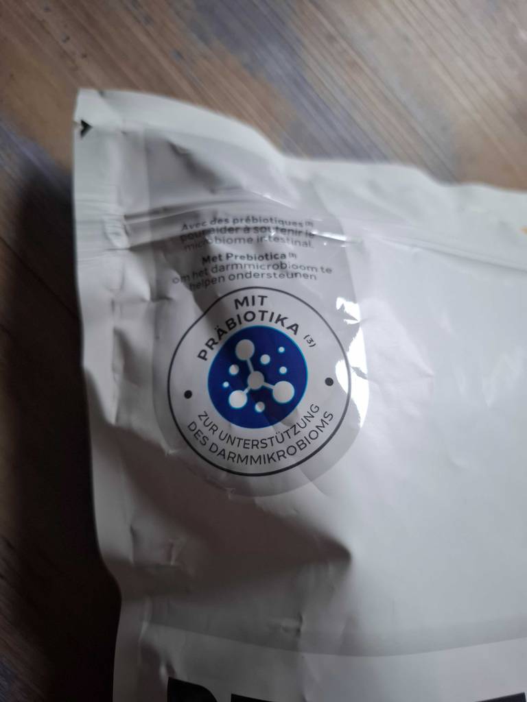 Hunde-Ergänzungsfutter-Test: Im oberen Eck der Packung stehen Informationen zur Wirkung.